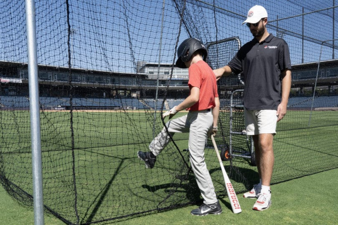 Home Run: Ultimate Backyard Batting Cage Setup with Pitching Machine