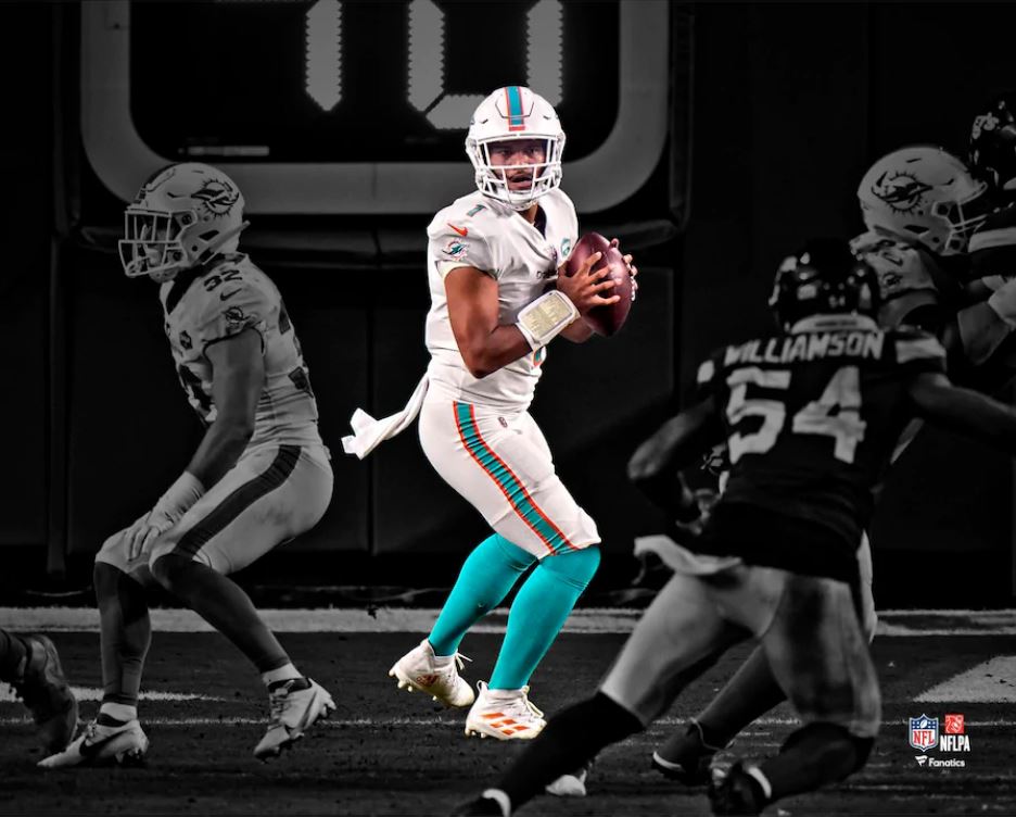 Tua Tagovailoa in Action Miami Dolphins 8" x 10" Blackout Football Photo
