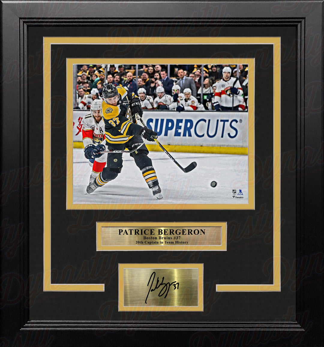 Patrice Bergeron in Action Boston Bruins 8" x 10" Framed Hockey Photo with Engraved Autograph