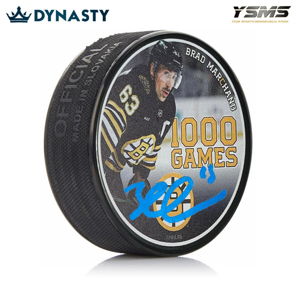 Dynasty Sports & Framing Autographed Pucks Brad Marchand Autographed Boston Bruins 1000 Games Commemorative Hockey Puck