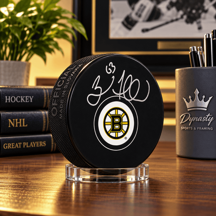 Dynasty Sports & Framing Autographed Pucks Brad Marchand Boston Bruins Autographed Hockey Puck