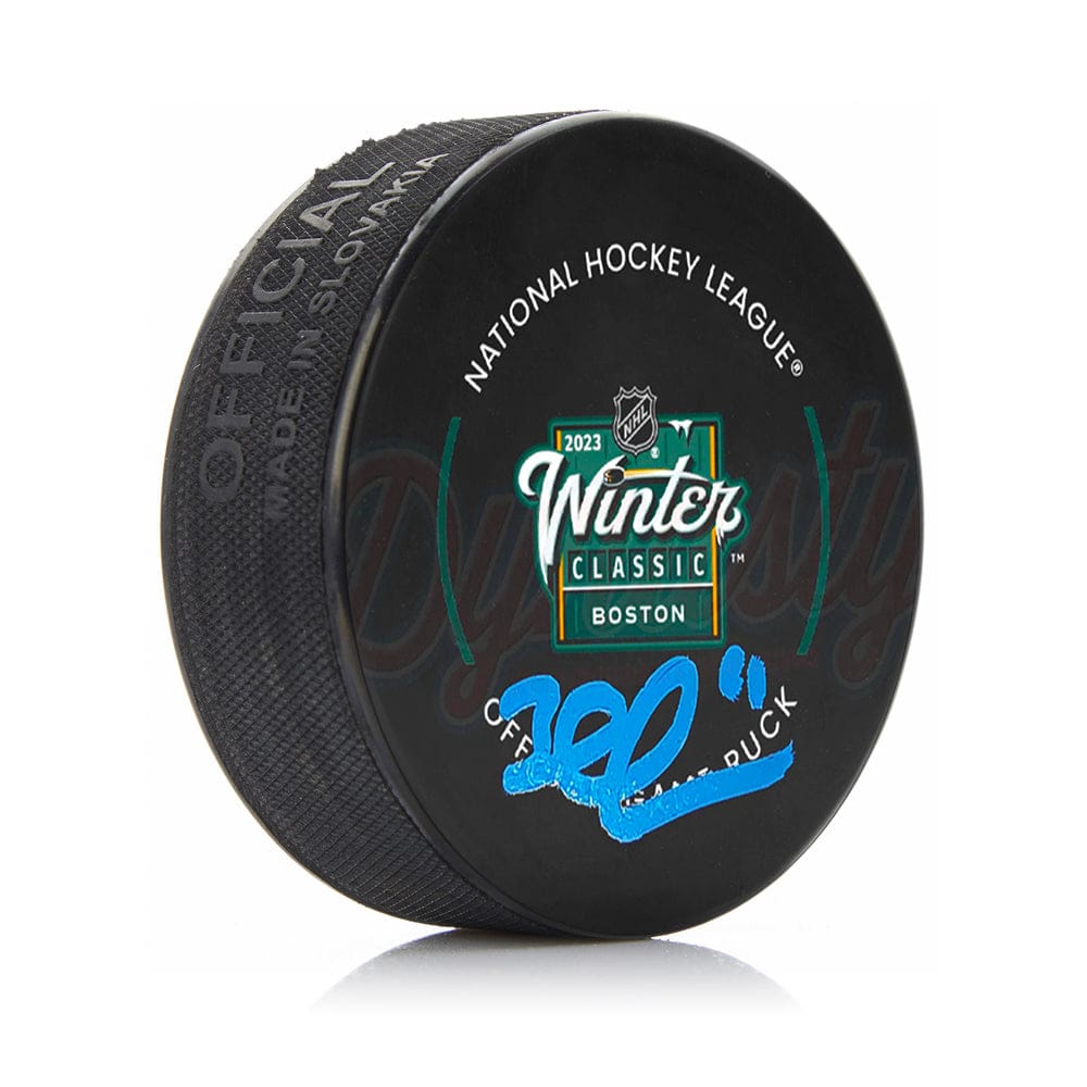 Dynasty Sports & Framing Autographed Pucks Brad Marchand Boston Bruins Autographed Official 2023 Winter Classic Game Hockey Puck