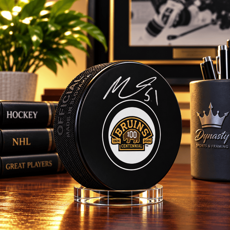 Dynasty Sports & Framing Autographed Pucks Matthew Poitras Autographed Boston Bruins 100th Anniversary Hockey Logo Puck