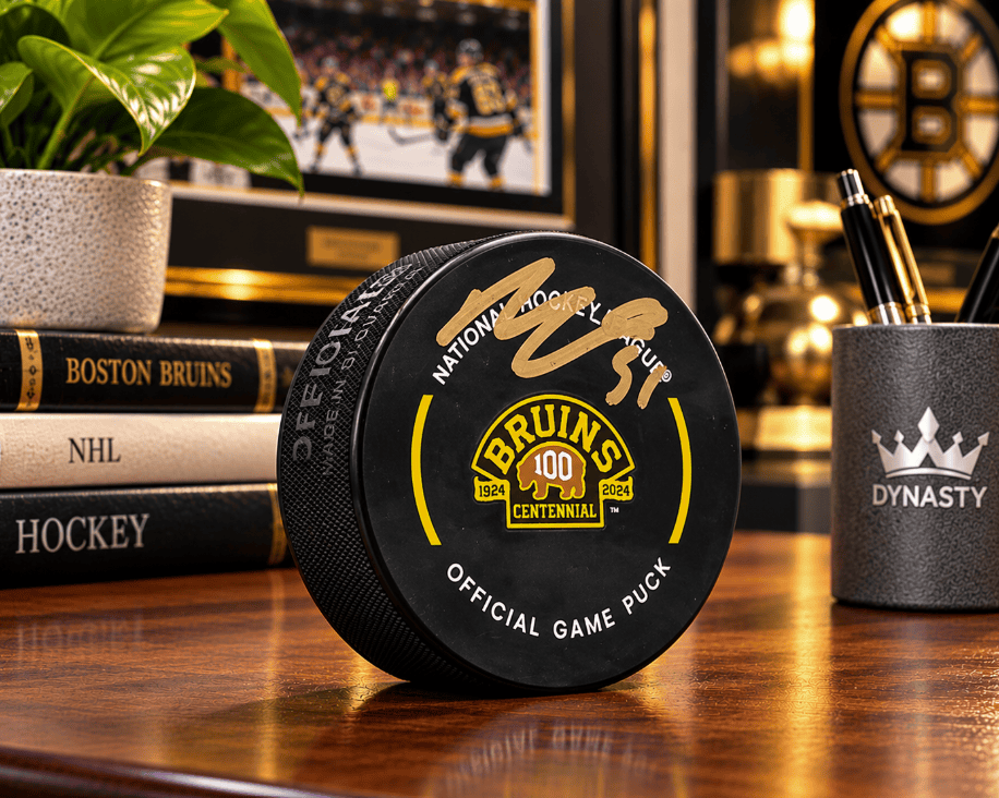 Dynasty Sports & Framing Autographed Pucks Matthew Poitras Boston Bruins Autographed 100th Anniversary Hockey Game Puck