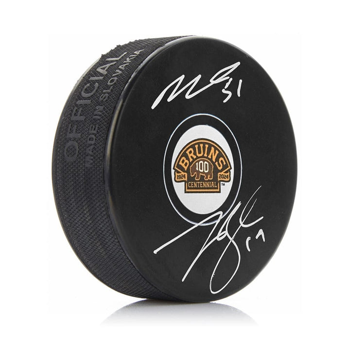 Dynasty Sports & Framing Autographed Pucks Matthew Poitras & Johnny Beecher Autographed Boston Bruins 100th Anniversary Hockey Logo Puck