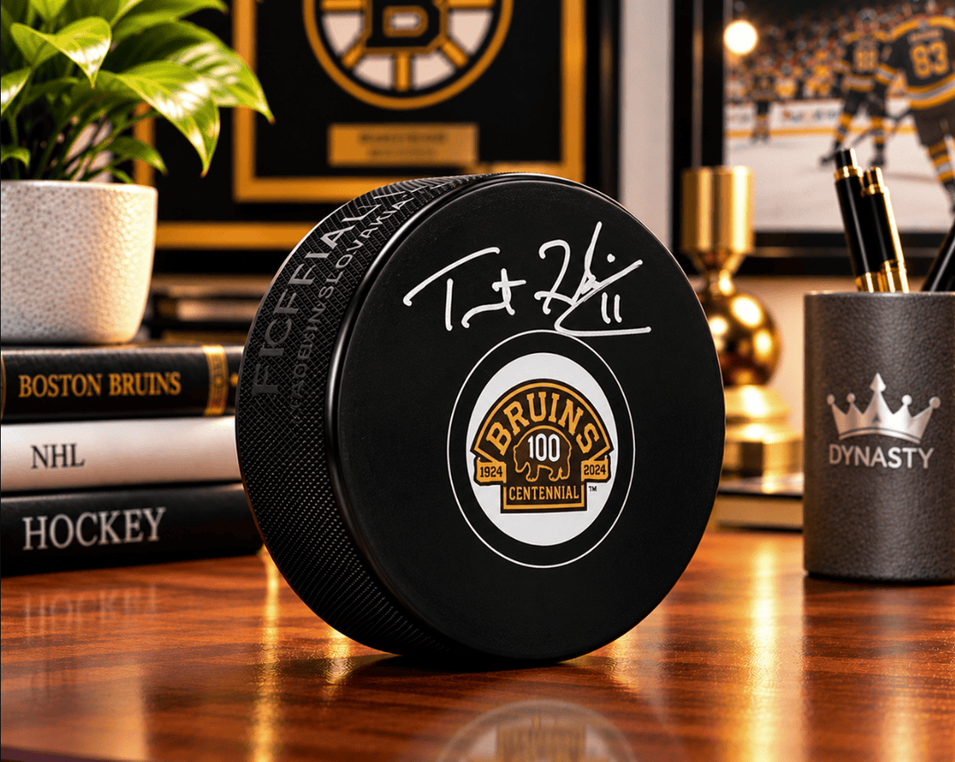 Dynasty Sports & Framing Autographed Pucks Trent Frederic Autographed Boston Bruins 100th Anniversary Hockey Logo Puck