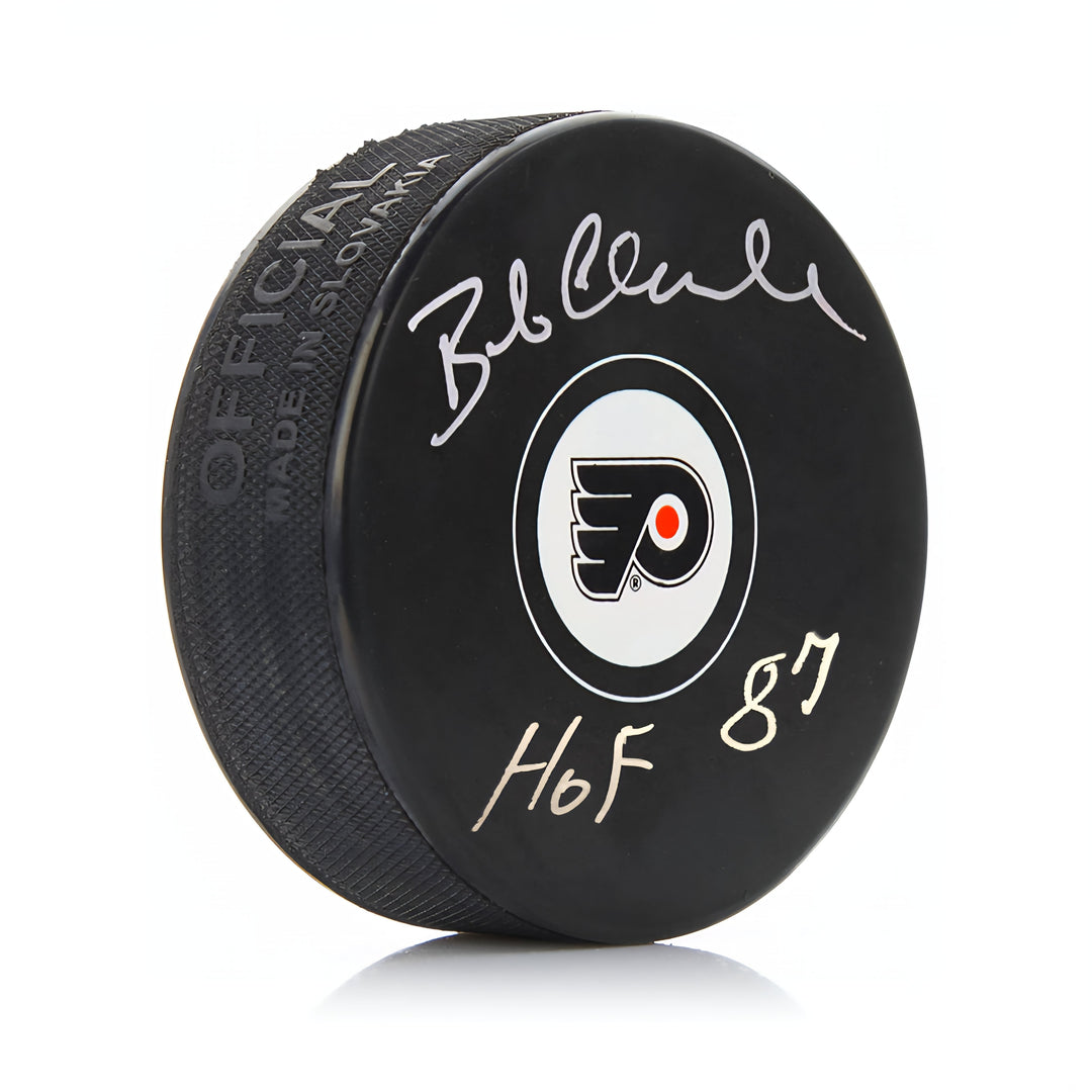 Bob Clarke Autographed Philadelphia Flyers Hockey Logo Puck with Hall of Fame Inscription